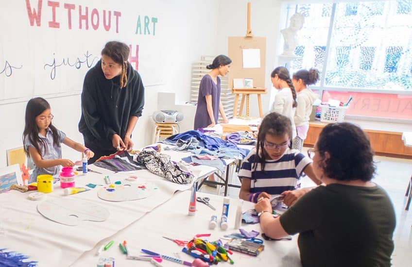 Tau Lewis leading a workshop with Kingston-based Roots and Wings, a grassroots community group that works towards making space for racialized girls in Kingston. Photo: Garrett Elliott