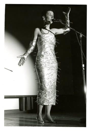 Shawna Dempsey, performing Thin Skin Normal, at Feminist Practice in the Visual Arts symposium, 1995