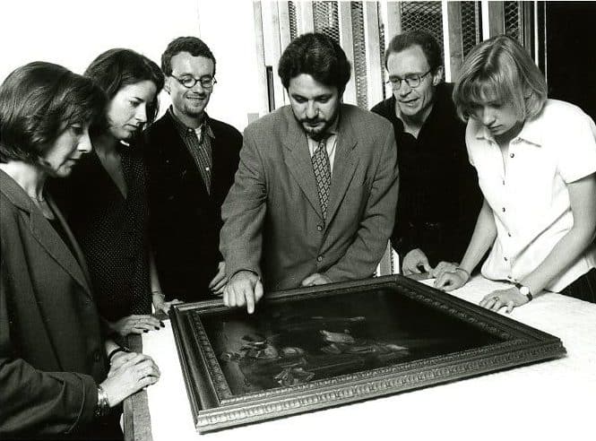 Dr. Volker Manuth with students, examining Jacob van Spreeuwen’s Allegory of Vanitas, for the exhibition Wisdom, Knowledge and Magic, 1996