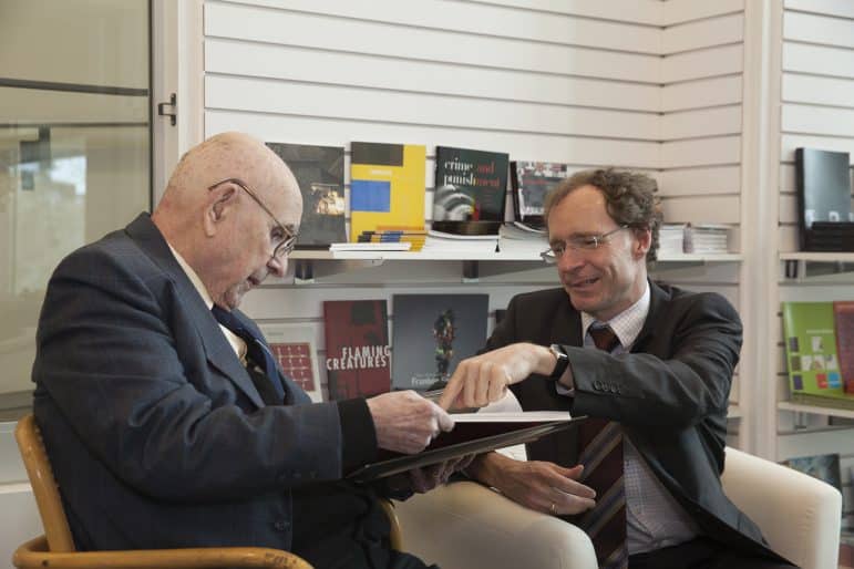 David de Witt, Bader Curator of European Art, with Dr. Alfred Bader looking at The Bader Collection: European Paintings, 2014
