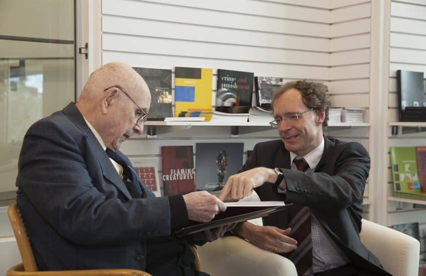 David de Witt, Bader Curator of European Art, with Dr. Alfred Bader looking at The Bader Collection: European Paintings, 2014