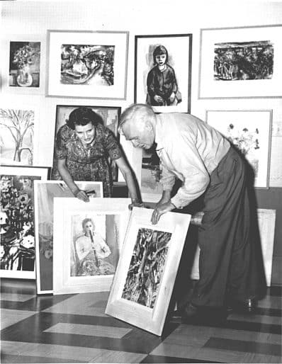 Frances K. Smith and André Biéler examining Annual Spring Exhibition submissions, 1959. Photo: DEWAR