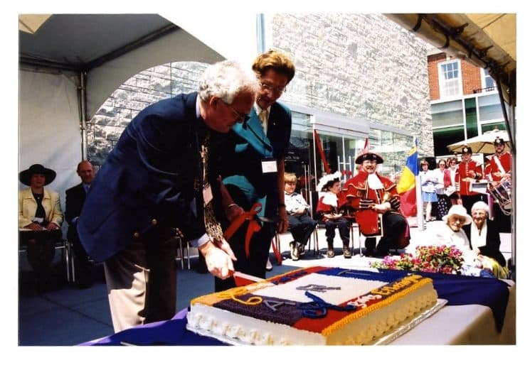 David McTavish, Director, and Chancellor Agnes Benidickson cut the cake at the Grand Re-Opening, 2000