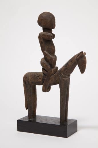 Dogon peoples, Mali, Equestrian Figure, unknown date, wood and inlaid metal. Gift of Justin and Elisabeth Lang, 1984 (M84-052). Photo: Paul Litherland