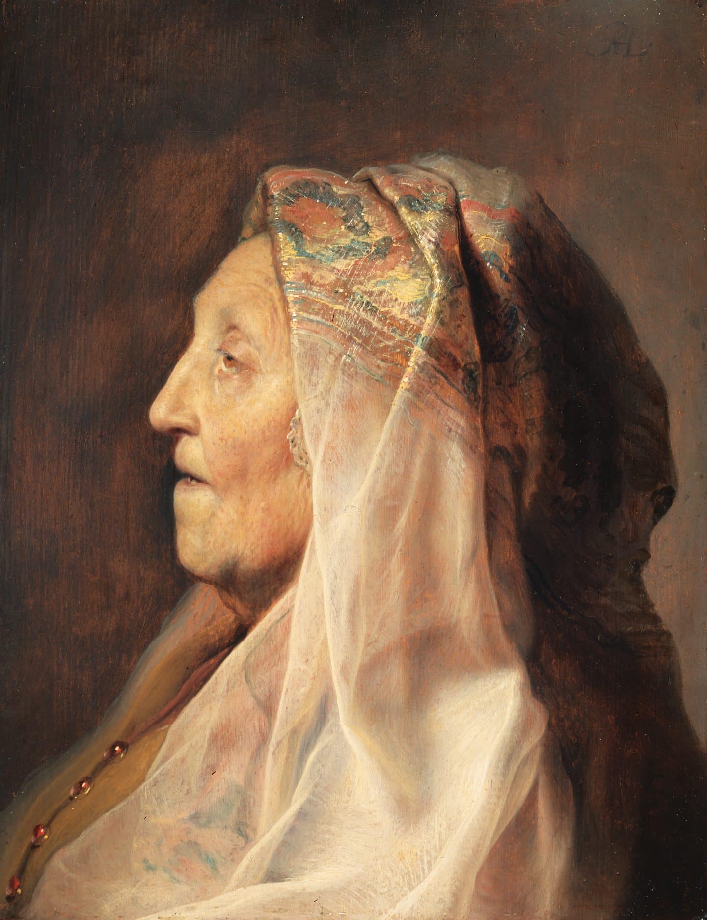 Head of an elderly woman, with an ornately decorated veil of fine translucent fabric placed over her head.