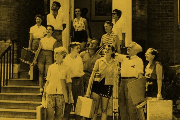 Art professor André Biéler and his students stand at the entrance of the new Agnes Etherington Art Centre in the summer of 1958. (Queen's University Archives)