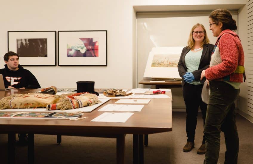 Heather Parker and Anya Hageman bring Indigenous economies to life through objects from the collection. Photo: Tim Forbes