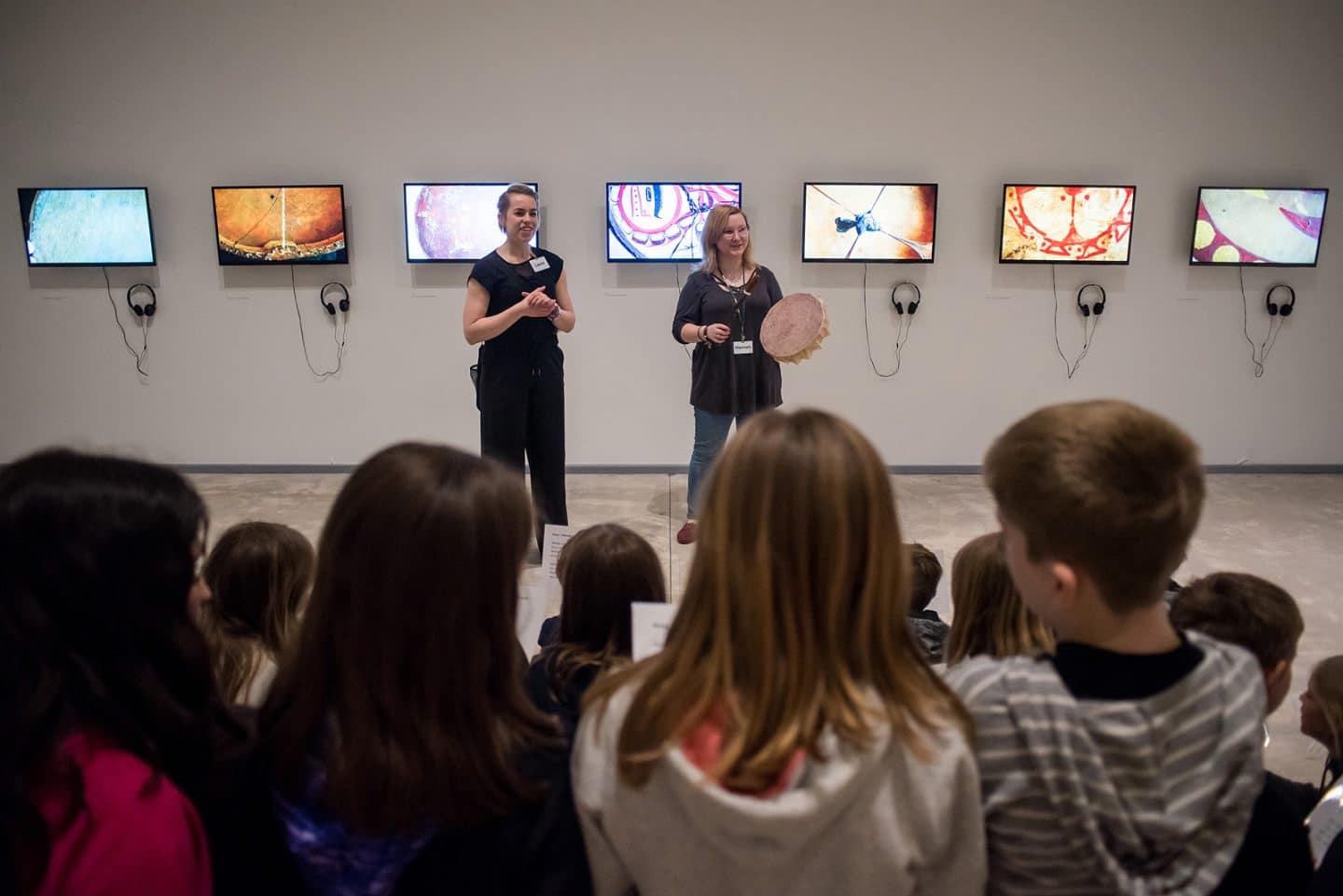 Laura Flemming and Hannah St. Lawrence lead a tour of Soundings: An Exhibition in Five Parts. Photo: Garrett Elliott