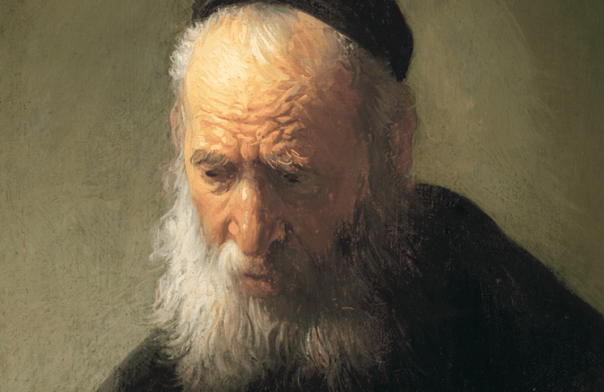 Bust of an elderly bearded man dressed in black with a black cap on his head looking downward.