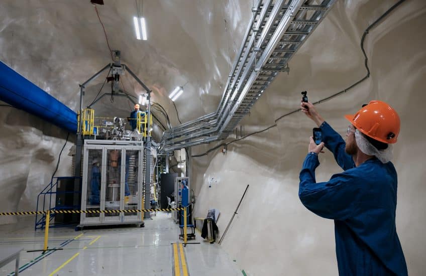 Artist Jol Thomson documents researchers working on CUTE (a Cryogenic Underground Test Facility) at SNOLAB. Photo: Gerry Kingsley.