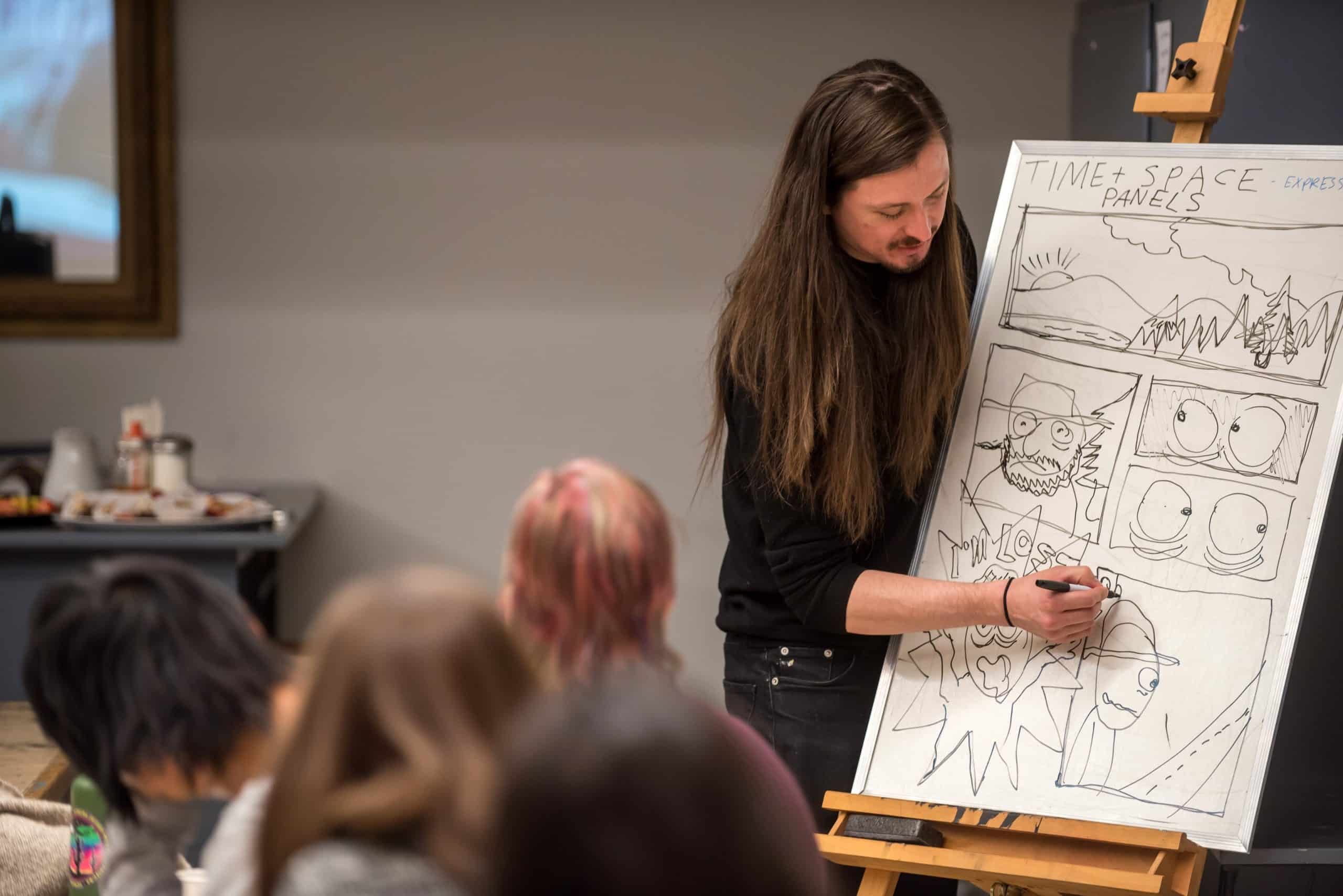 Walter Scott leads an open studio workshop on comic writing and drawing.