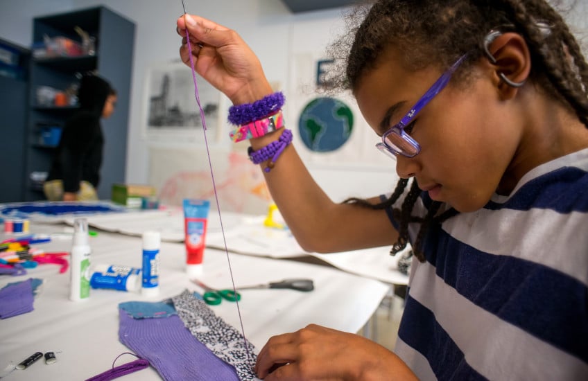 Children immerse in artmaking with Agnes.