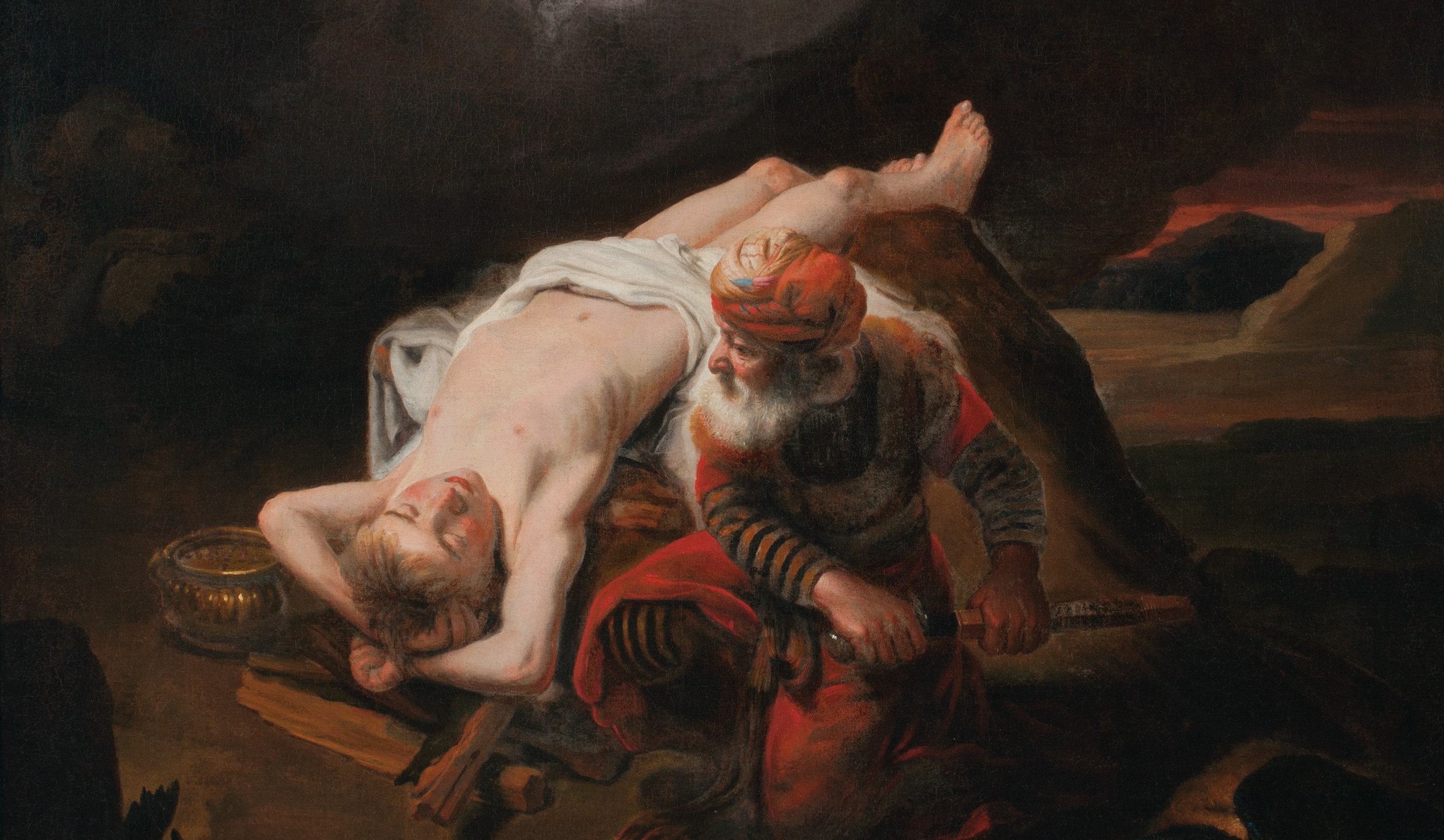Isaac is depicted as a nude young man, bound to rock and wood on the ground. Abraham kneels beside him, wearing a scarlet robe and drawing his knife.
