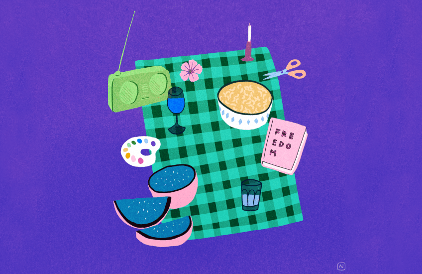 A purple background with a checkered picnic blanket, along with a book that says FREEDOM, a hibiscus flower, watermelon, scissors, a paint palette, a radio, candle.