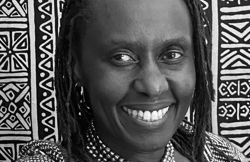 Portrait of Juliane Okot Bitek in black and white.a