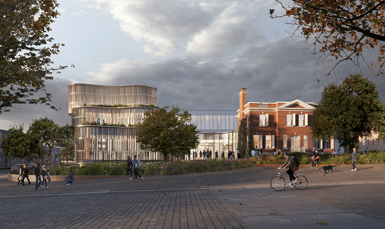 A digital rendering of a university campus showing a historic red brick building and a modern glass extension to its left.