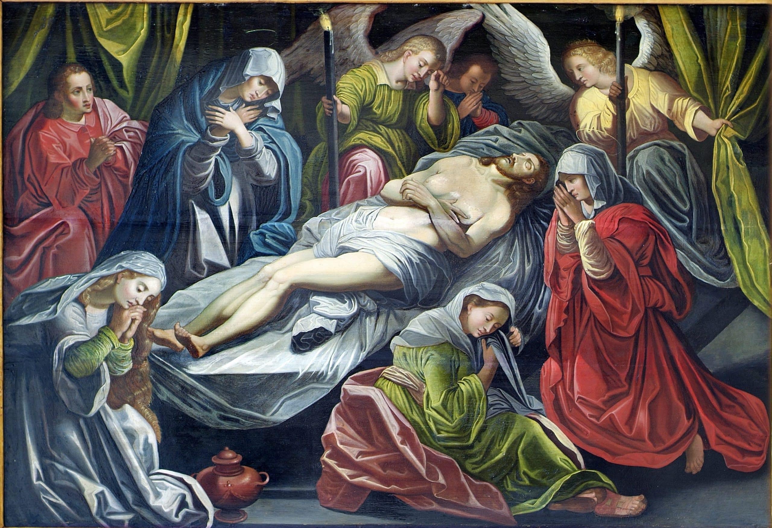 A painting showing figures lamenting the death of Christ. Christ's body is laid on a table.