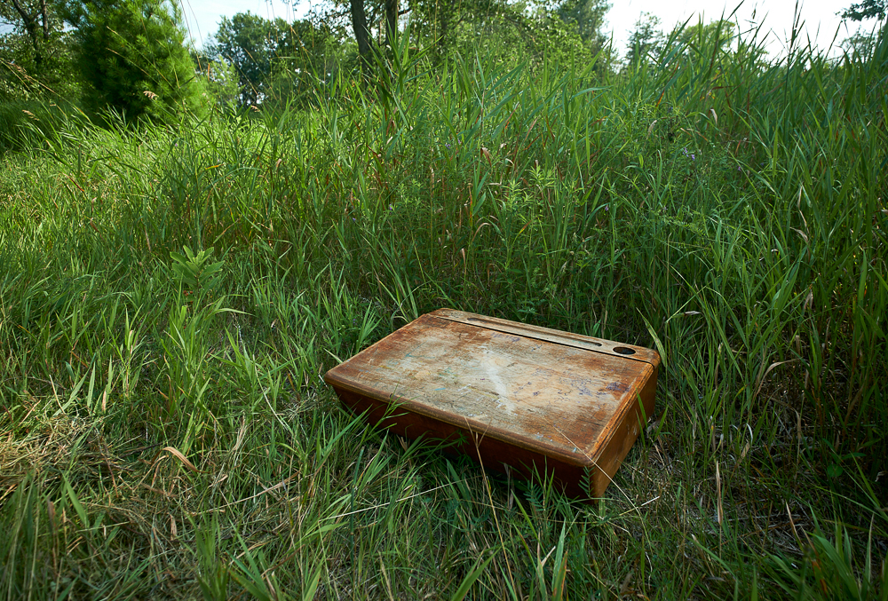 Andy Berg,Etheric Interlude, 2023, found objects, coil-built clay objects, local eastern white cedar field table