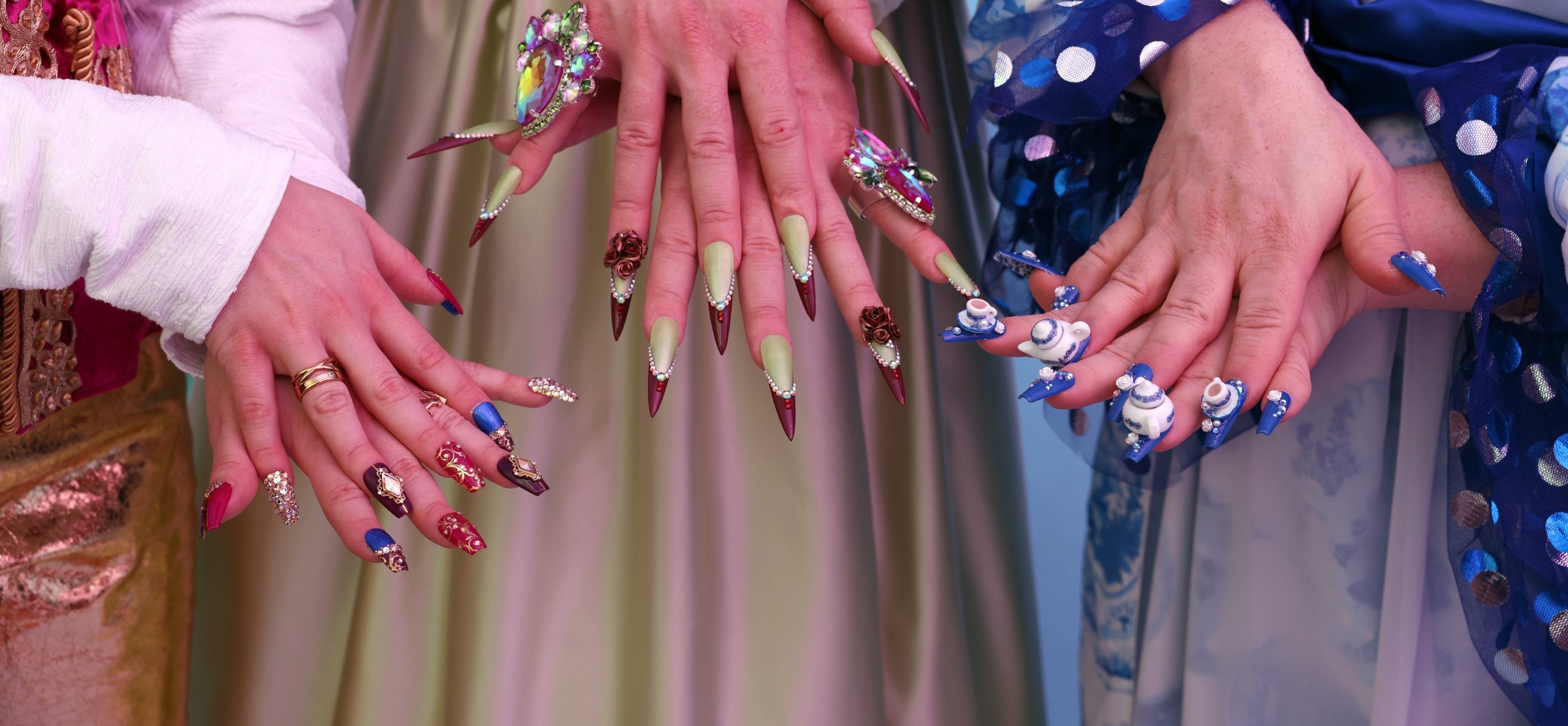 Dare de LaFemme, Rowena Whey and Tyffanie Morgan showcase their nails done by Funeral Face Nails (@funeralfacenails). Photo: Bernard Clark